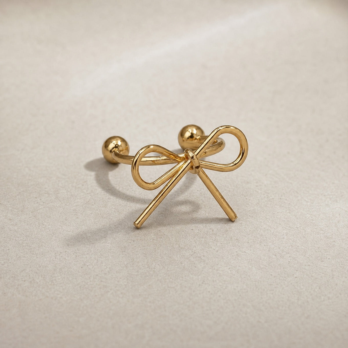 Aurika – Cercel-clips elegant cu fundă